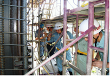 Participants keenly observing the cross section of a bridge pier