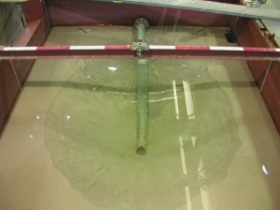 Photograph of the plane figure appearing in the lower right of thegconceptual image of sheet sand-removal technologySediment is being suctioned out.